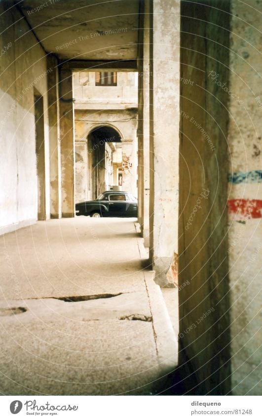 vintage car Havana Cuba Arcade Motor vehicle Car Foyer Carriage Traffic infrastructure black olditmer black car Column Corridor