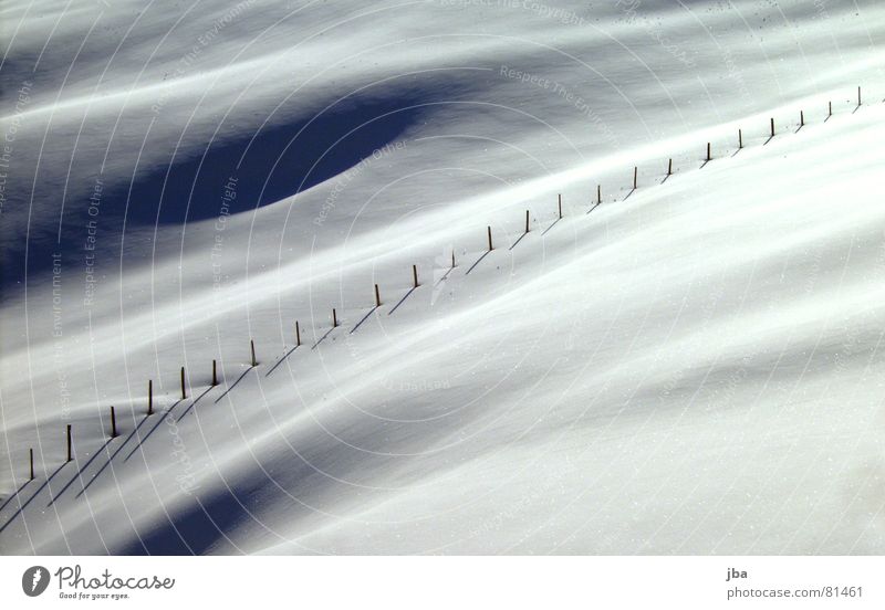 The fence Wooden stake Fence Diagonal Border Hill Virgin snow Beautiful Shadow Darken hilly wooden sticks Snow Powder snow Deep snow Uneven Exterior shot