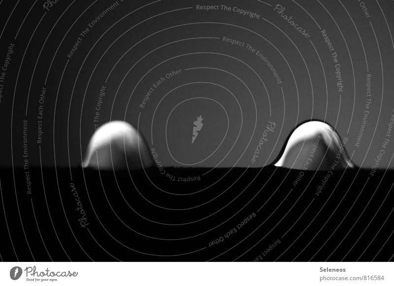 an island with two mountains Environment Nature Water Drops of water Rain Fluid Near Wet Natural Pure Black & white photo Interior shot Close-up Detail