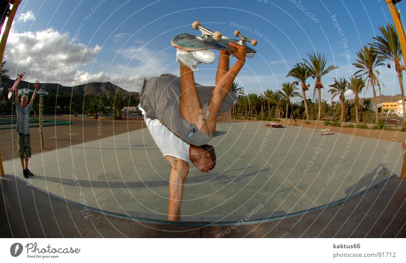 handplant Palm tree Ocean Asphalt Brown Air Extreme Freak Park Skateboard Trick Vacation & Travel Jump Handstand Stunt Skateboarding Live Salto Fisheye Sports