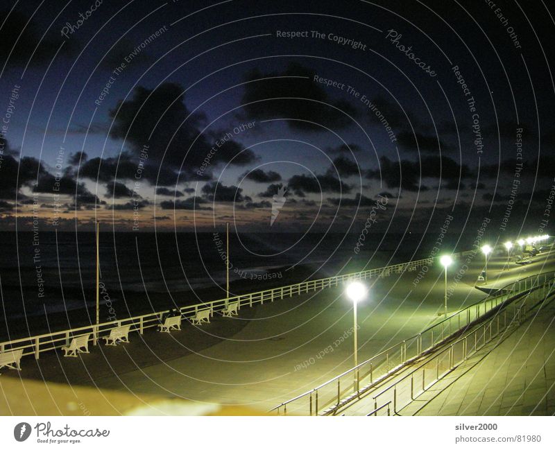 Beach promenade at night Night Dark Ocean Light Lamp Sylt Coast Water