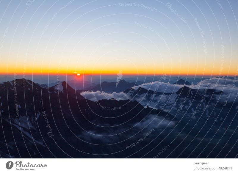 Early in the day Nature Landscape Cloudless sky Summer Beautiful weather Rock Alps Mountain Peak Authentic Blue Yellow Austria Grossglockner Snow Clouds early