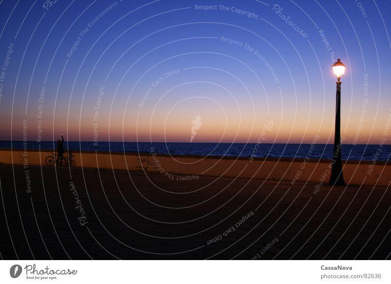 Lighthouse - tower Lamp Night Ocean Sunset Twilight Evening Harbour pilot Sky Human being Blue Dusk