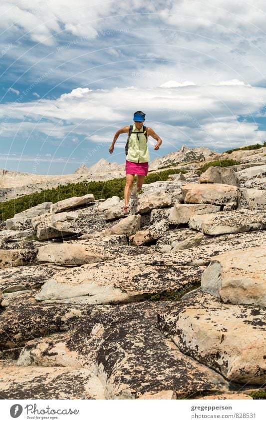 Hiker in the Yosemite wilderness. Adventure Mountain Hiking Climbing Mountaineering Woman Adults 1 Human being Clouds Running Self-confident Determination