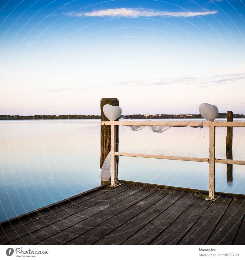 landing stage with balloons Calm Nature Landscape Water Clouds Lake Heart Blue Emotions Moody Footbridge groynes Sky silent sea jetty groin cloud silence