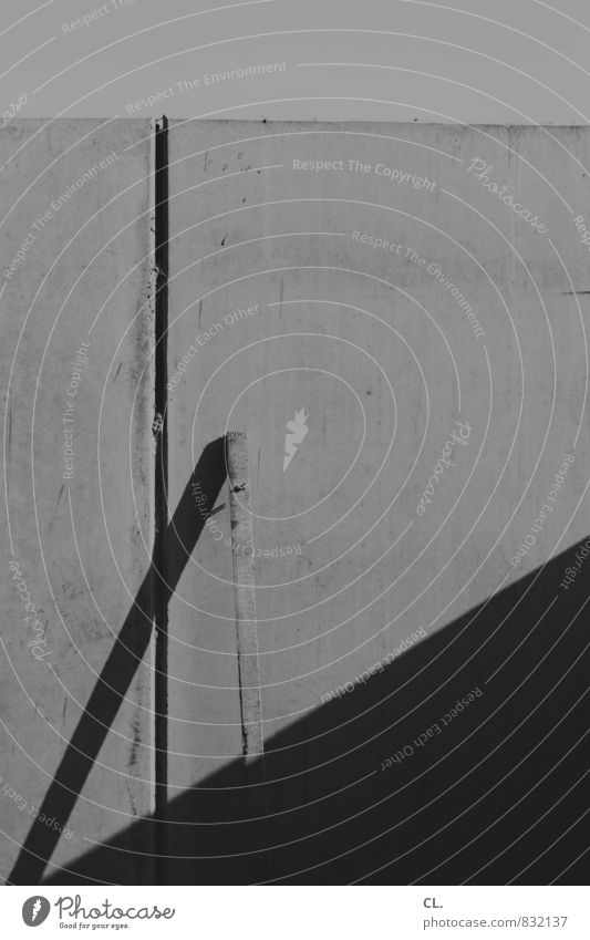 the order of things Construction site Wall (barrier) Wall (building) Build Gloomy Wooden board Traces of fomer wall Black & white photo Exterior shot Abstract