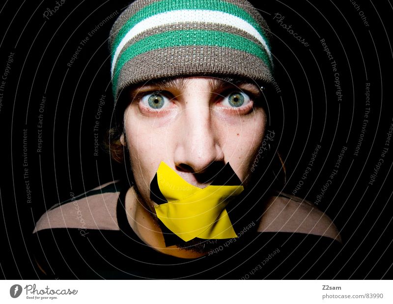 quiet please II Style Shackled Gagged Adhesive tape Stick Human being Stripe Facial hair Gray Yellow Calm Fear Threat Headband Pallid Green Diagonal Man has