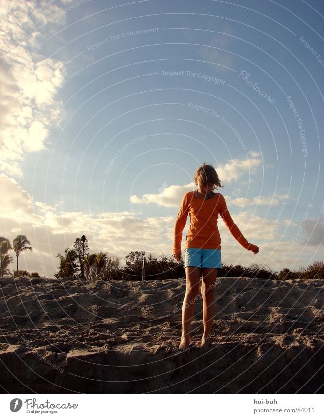 The sandy beach Child Beach Palm tree Girl Sunset Evening Dark Night Clouds Sky Shadow Hill Cold Breeze Pebble Tree Coast Ocean USA Earth Sand Orange Mountain