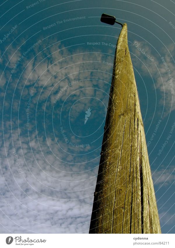 high up Lamp post Wood Lantern Light Tree Altocumulus floccus Worm's-eye view Far-off places Sublime Task Nostalgia Warped Archaic Services Train station Sky