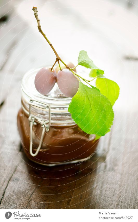 Plum puree 2 Food Fruit Jam Breakfast Table Fresh Delicious Sweet plum puree Jam jar Preserving jar Self-made Wooden table Twig Colour photo Interior shot Day