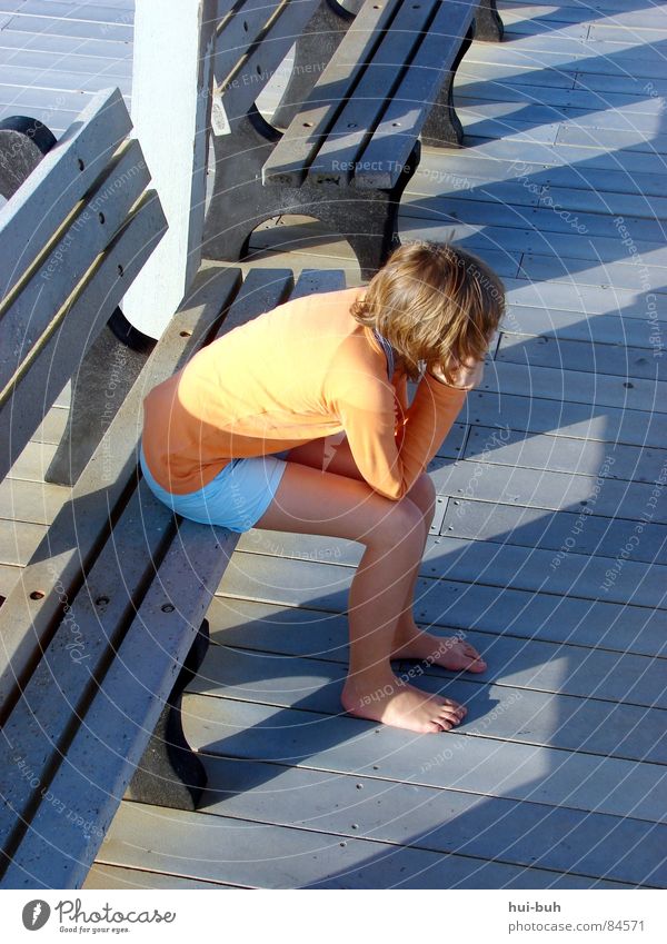 Alone on a bench while the sun goes down. Imply Sunset Calm Barefoot Cold Grief Loneliness Boredom Child Vacation & Travel Youth (Young adults) Think Forget