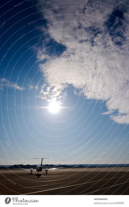 plane in the sun Runway Covers (Construction) Airplane Sky Airfield Back-light Aircraft Passenger plane Jet Machinery Airport Germany Success Sun clouds blue