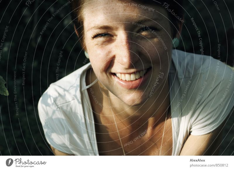 young freckled woman laughs into the camera Joy Happy Young woman Youth (Young adults) Face Freckles 18 - 30 years Adults Nature Beautiful weather Forest