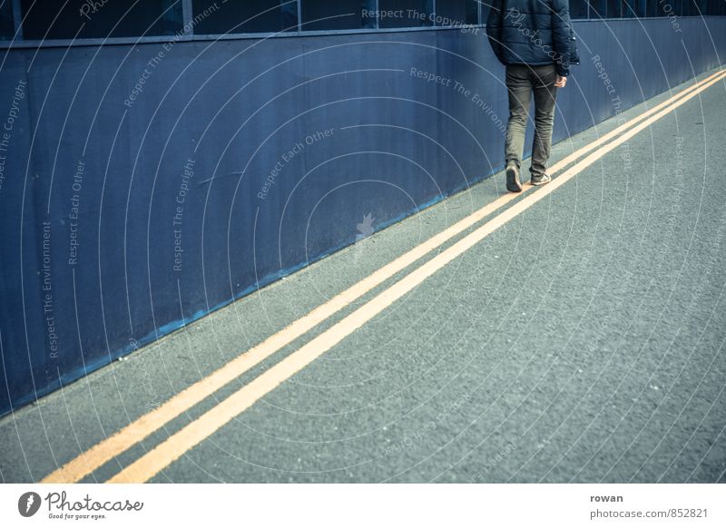 Walk The Line Human being Masculine Young man Youth (Young adults) Man Adults 1 Street Going Parallel Signs and labeling To go for a walk Blue Wooden wall