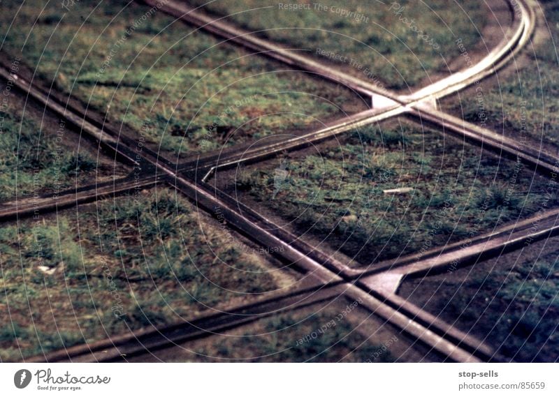 Meeting point Interface Cross Going Grass Railroad tracks Tram Pattern Rectangle Geometry Direction Difference Encounter Bend collide parallelogram digress Date