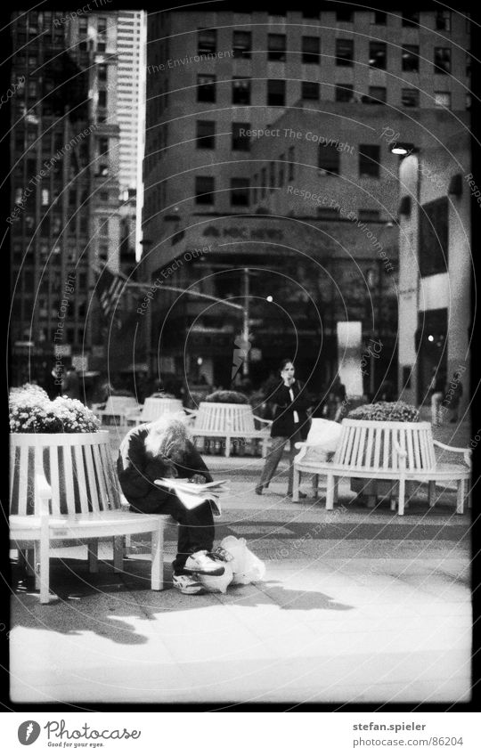 Homeless Rockefeller Center Plaza New York City Tramp Facial hair Newspaper Poverty Financial difficulty Pathetic To enjoy Beg Amusement Park Man poor Bench