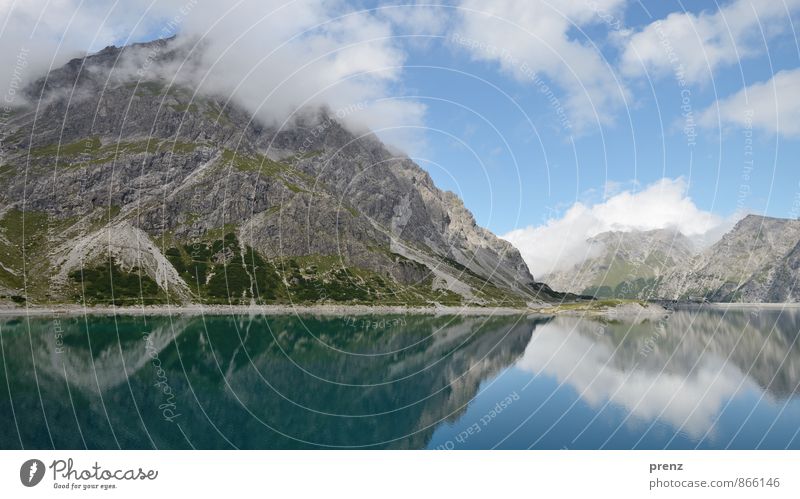 mountain lake Environment Nature Landscape Beautiful weather Alps Mountain Peak Lake Blue Gray Reflection Sky Clouds Austria Colour photo Exterior shot Deserted