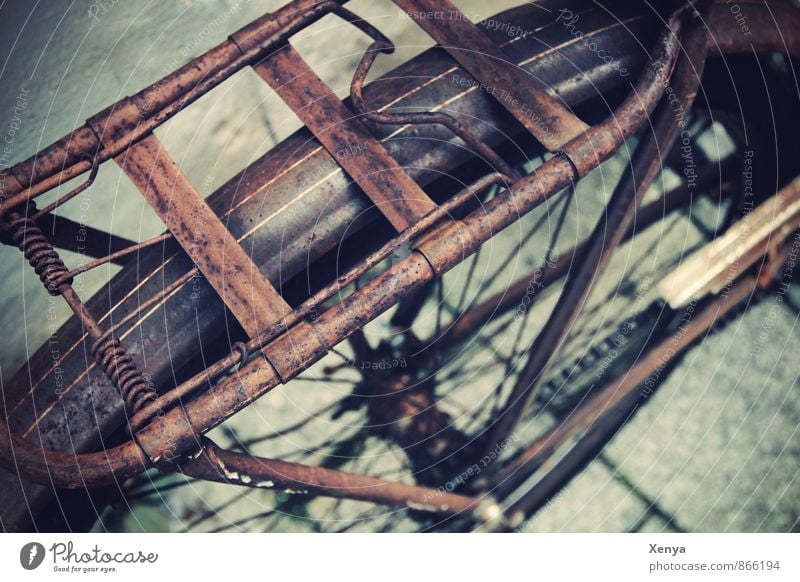 design grate Bicycle Metal Retro Brown Rust luggage carrier Street Old Exterior shot Deserted Day Shallow depth of field