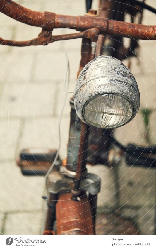 Rust in its most beautiful form Bicycle Old Retro Brown Bicycle light Handlebars Glass Metal Sidewalk Deserted Shallow depth of field