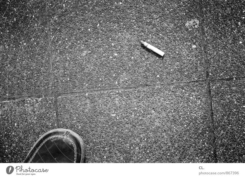 look down Smoking Human being 1 Footwear Cigarette Cigarette Butt Asphalt To enjoy Boredom Break Stagnating Cigarette break Black & white photo Exterior shot