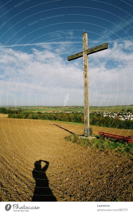 Cross on the mountain Religion and faith Christianity Darken Landmark Monument Blue sky fair weather Landscape Back Shadow Vantage point believe in God