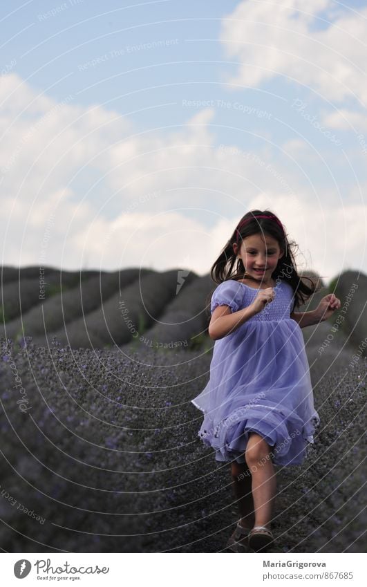 Little girl in a lavander field Human being Child Girl Body 1 3 - 8 years Infancy Nature Landscape Plant Sun Summer Field Dress Brunette Movement To enjoy