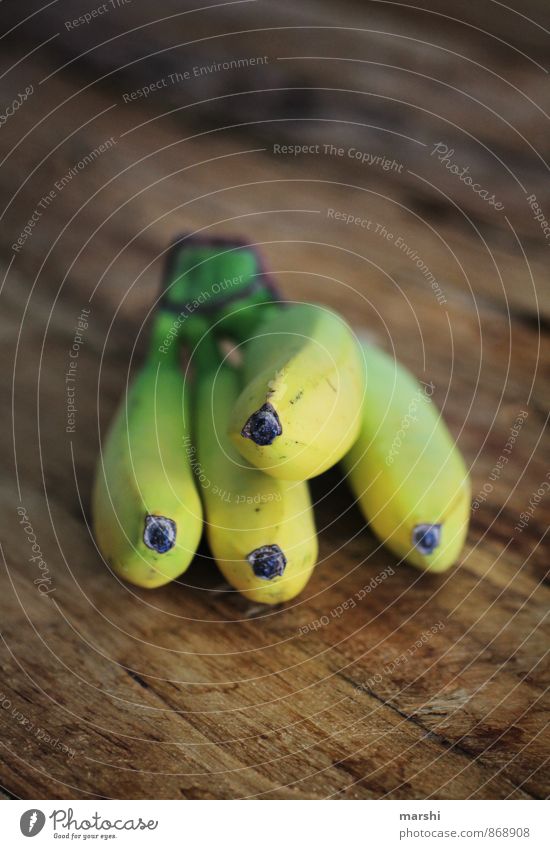 baby pineapple Food Fruit Nutrition Eating Emotions Banana Yellow Exotic Delicious Appetite Snack Small Wooden table Colour photo Interior shot Close-up Detail