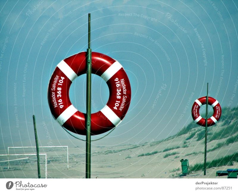 Lifebuoys - self-service Rescue Red Ocean Beach Grass Green Trash container September Portugal Autumn Circle Beach dune Blue Sky Gate