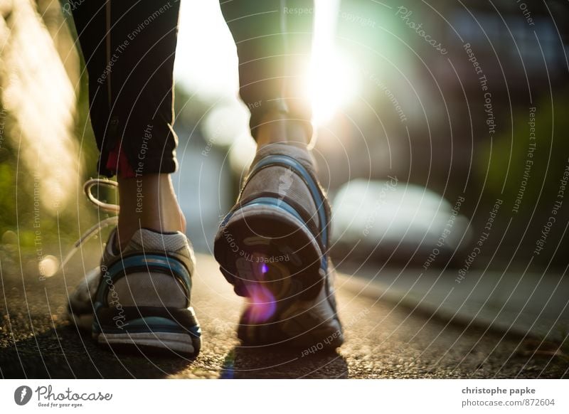 detail shot jogging shoes on street in back light Jogging Walking Sneakers running shoes Athletic Footwear Lifestyle Healthy Fitness Sports Sports Training