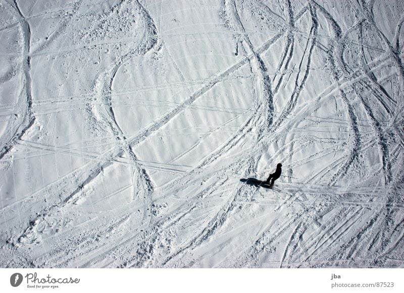 no longer fresh Bird's-eye view Virgin snow Powder snow Power Skier Skiing Winter sports snow covered mist Snow Tracks Curve Line Shadow Wavy line