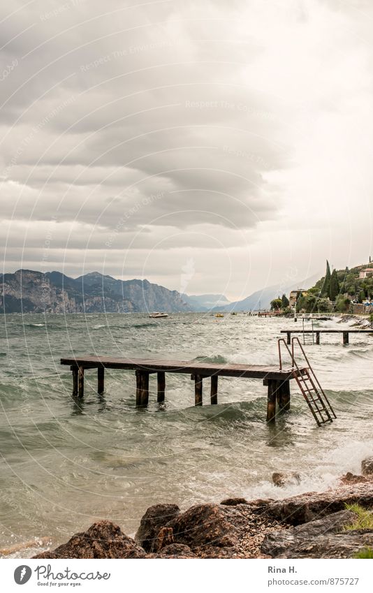 cheerful to cloudy Sky Clouds Horizon Summer Autumn Bad weather Wind Gale Rain Mountain Waves Coast Lakeside Vacation & Travel 2014 Footbridge Ladder Lake Garda