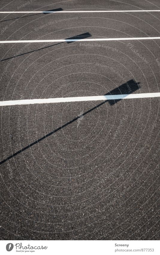 Shadows | UT Cologne Deserted Street Asphalt Sharp-edged Simple Gray Black White Perspective Shadow play Signs and labeling Line Parking Colour photo