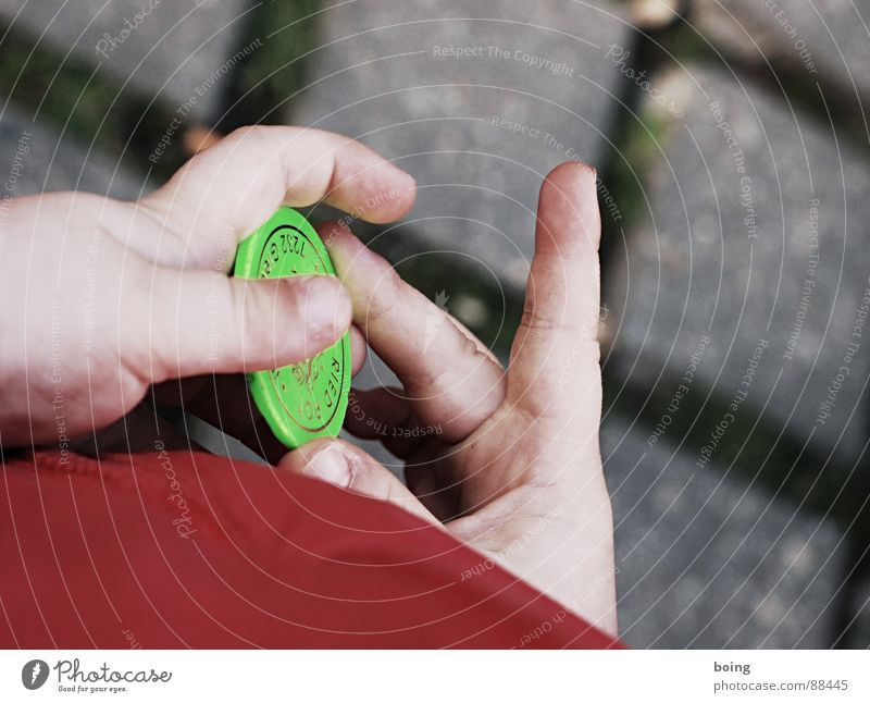 Feline Krull, fairground spotter and chip collector trip chip Finger game Children`s hand Fingers Poker chip Detail Section of image Partially visible