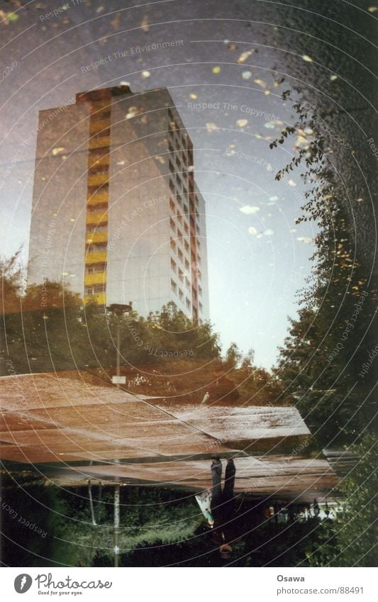 Liquid prefabricated building Building High-rise Puddle Man Australia Dreary Town East Reflection Friedrichshain Prefab construction Berlin Rain Cover