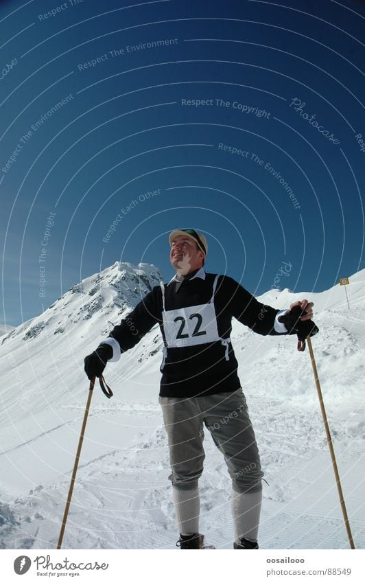 old fashioned Winter Nostalgia Winter sports Skier White Sports Playing Snow Mountain skiing Alps Blue