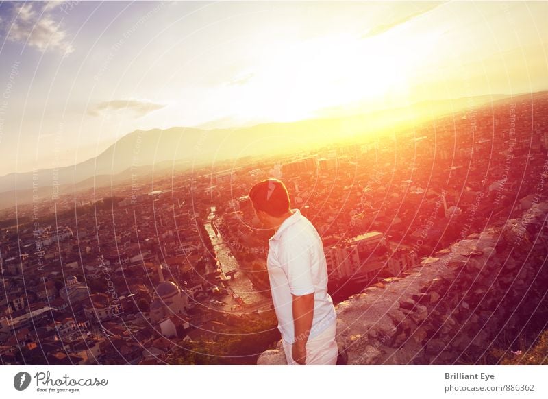 Man looking down into the city Tourism Freedom Summer Summer vacation Sun Mountain Human being Masculine Adults 1 18 - 30 years Youth (Young adults) Landscape