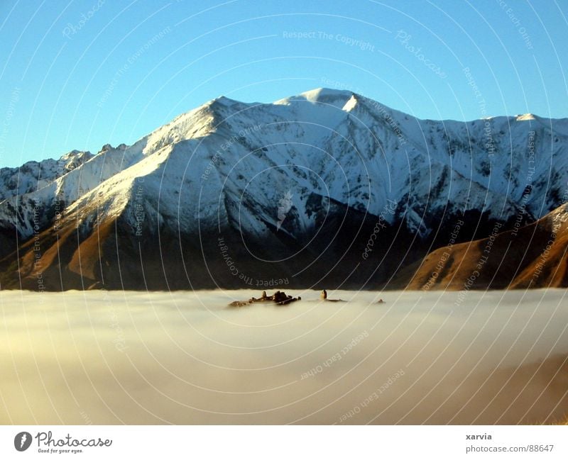 Castle hill in a sea of cloud Alpine Clouds New Zealand Mountain mountains peaceful calm snow