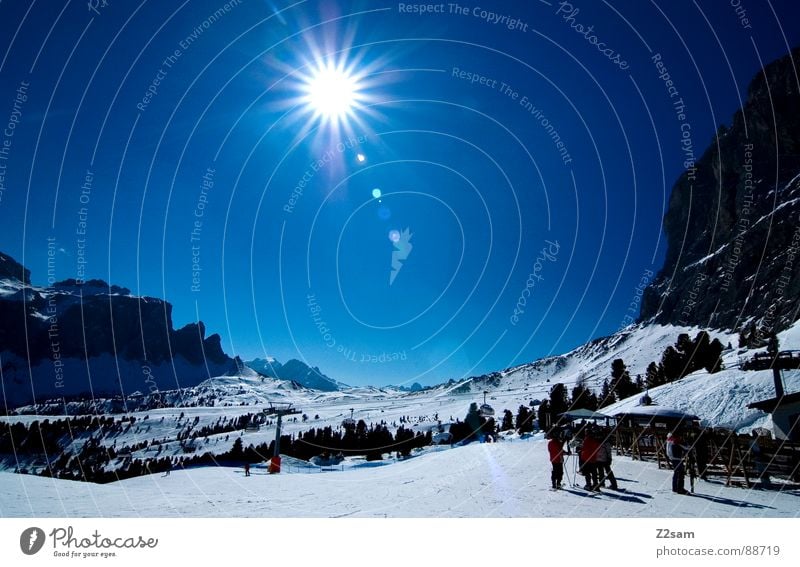 Arrival Skiing Snowboarding Ski resort Italy South Tyrol Cold Winter Human being Winter sports Physics Panorama (View) Mountain Above Sun Sky Blue Rock Sports