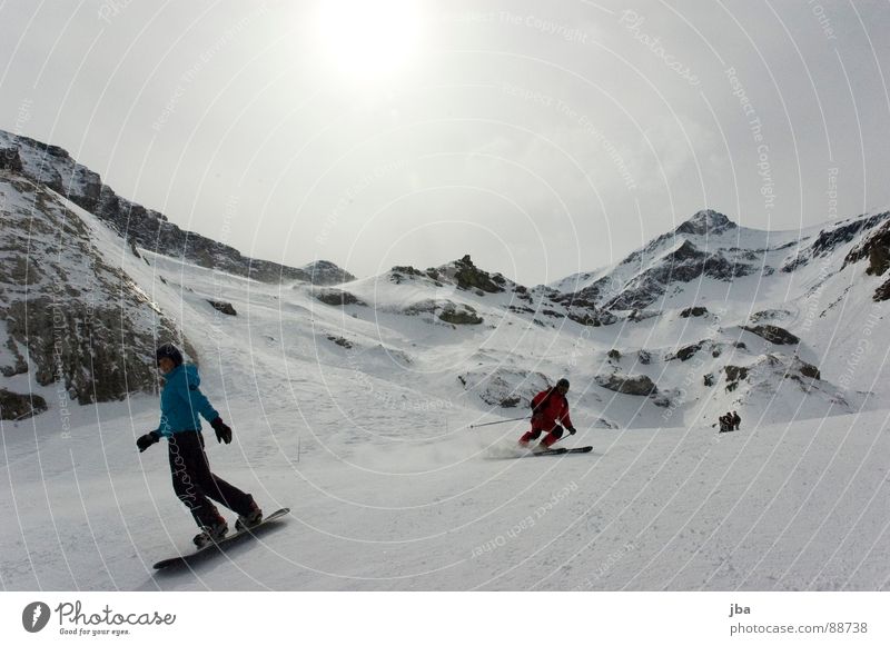 Skiing | Boarding Snowboard Driving Past Posture Rotate Speed Jacket Pants Helmet Skier Red Gray White Bad weather Clouds Glacier National park Man Woman