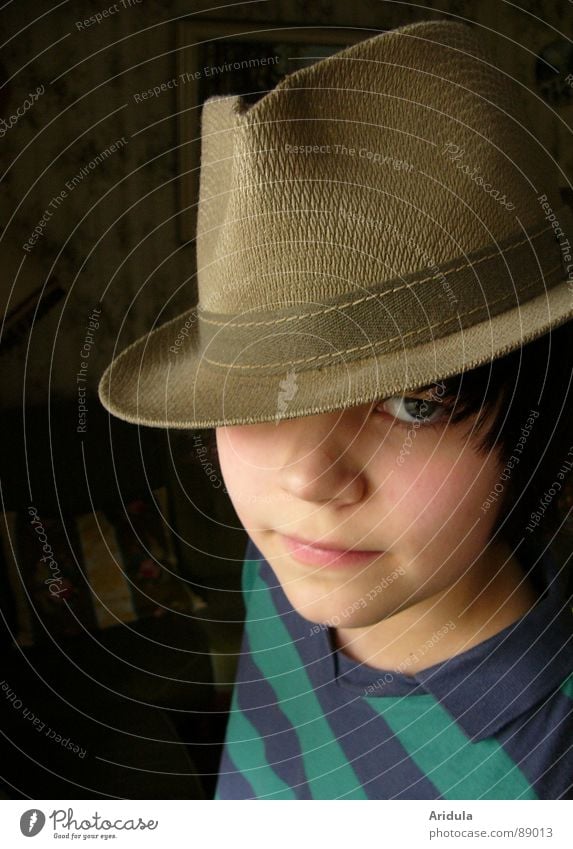 opas hat Child portrait Posture Looking Hat Face Eyes Cool (slang) Boy (child) Colour photo Looking into the camera Interior shot Human being grandpa