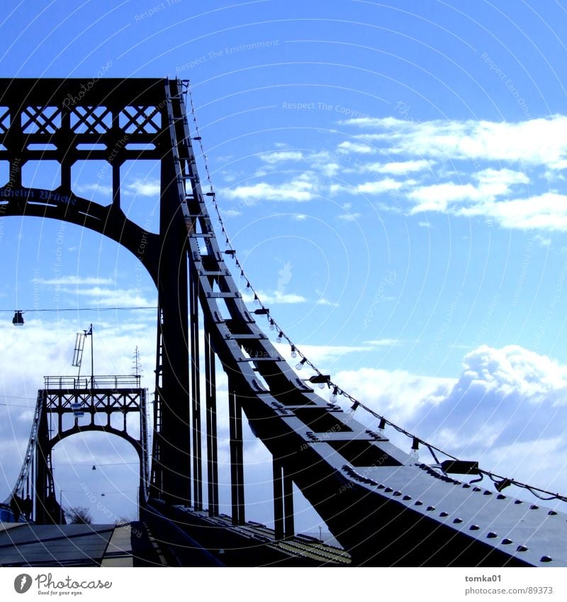 Employee-friendly bridge days | Clouds White Dark Black Europe Wilhlemshaven Iron Beautiful Exterior shot Bridge Germany Sky Bright Blue iron bridge Metal