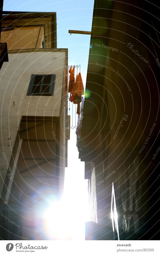 LightAisle Laundry Clothesline Evening sun Afternoon Narrow Slit Palma de Majorca Sky blue Back-light Celestial bodies and the universe Traffic infrastructure