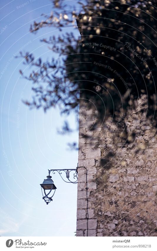 With his lantern. Art Esthetic Contentment Street lighting Lantern Southern France Mediterranean Old town Cote d'Azur Olive tree Building Wall (building)