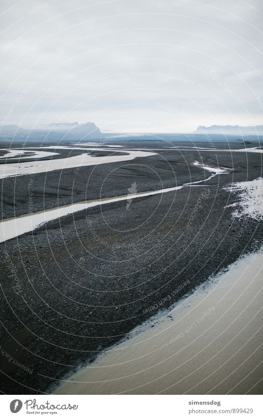 I'm in Iceland. Landscape Clouds Fog Mountain River bank Brook Nature Riverbed glacial river Gravel Colour photo Subdued colour Exterior shot Deserted