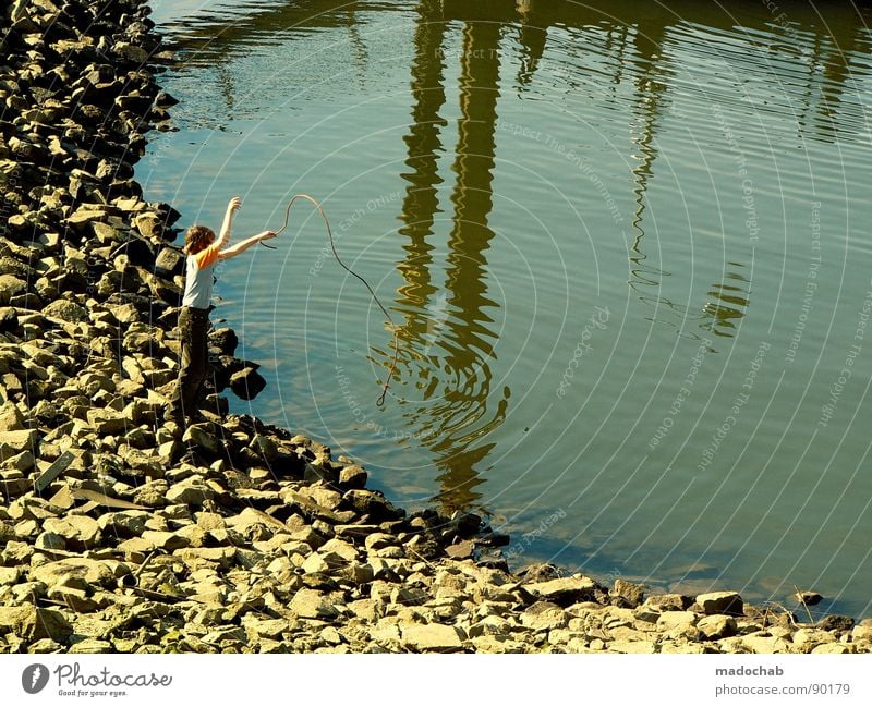 CATCH YOUR ILLUSIONS Lake Pond Harbour Angler Fishing (Angle) Reflection Summer Playing Childlike Childish Leisure and hobbies Human being boy Basin Water Stone