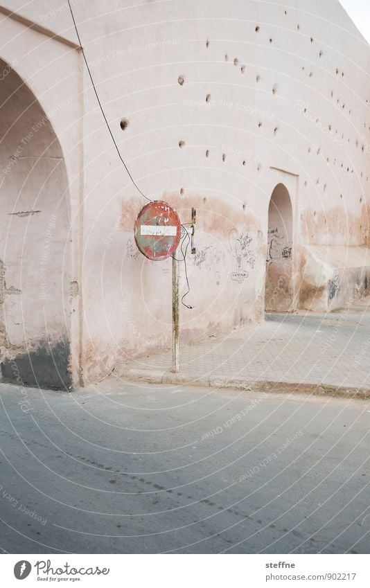 You're not coming in here. Transport Street Road sign Signs and labeling Town Calm One-way street Marrakesh Morocco City wall Refugee Wall (barrier) Border