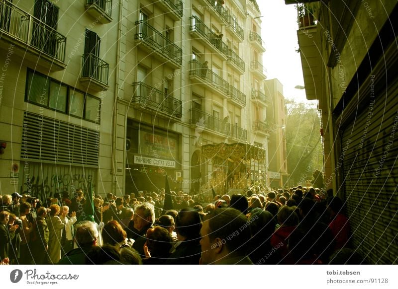 BCN Barcelona Spain Holy Week Crowd of people Facade Carriage Back-light Shaft of light Physics Group bcn Human being Mask Warmth