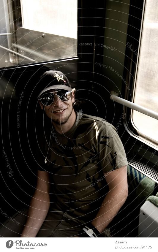 in the train IV Railroad Vacation & Travel In transit Driving Railroad tracks Man Sunglasses Baseball cap Facial hair Masculine Light Sunbeam Stripe Pattern