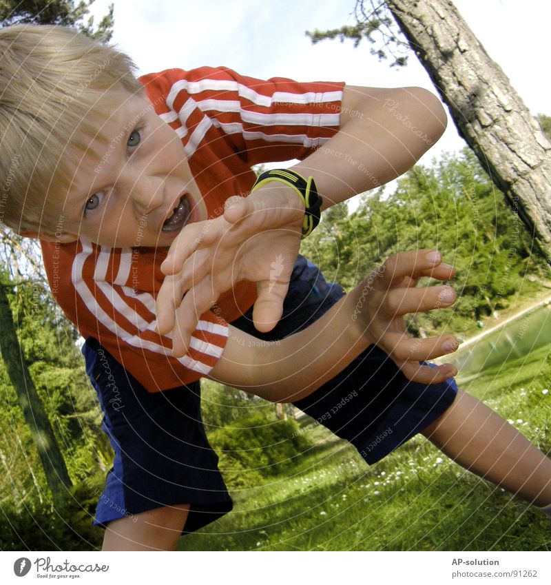 OAAAHHHRR! *2* Boy (child) Child Blonde Grimace Facial expression Emotions Gesture Claw Tooth space Hand Fingers Fist Scare Anger Evil T-shirt Red Forest