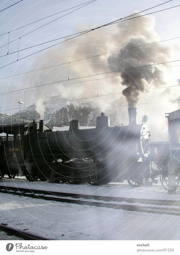 Steam nostalgia II Colour photo Subdued colour Exterior shot Deserted Copy Space bottom Morning Light Shadow Contrast Sunlight Back-light Winter Snow Landscape